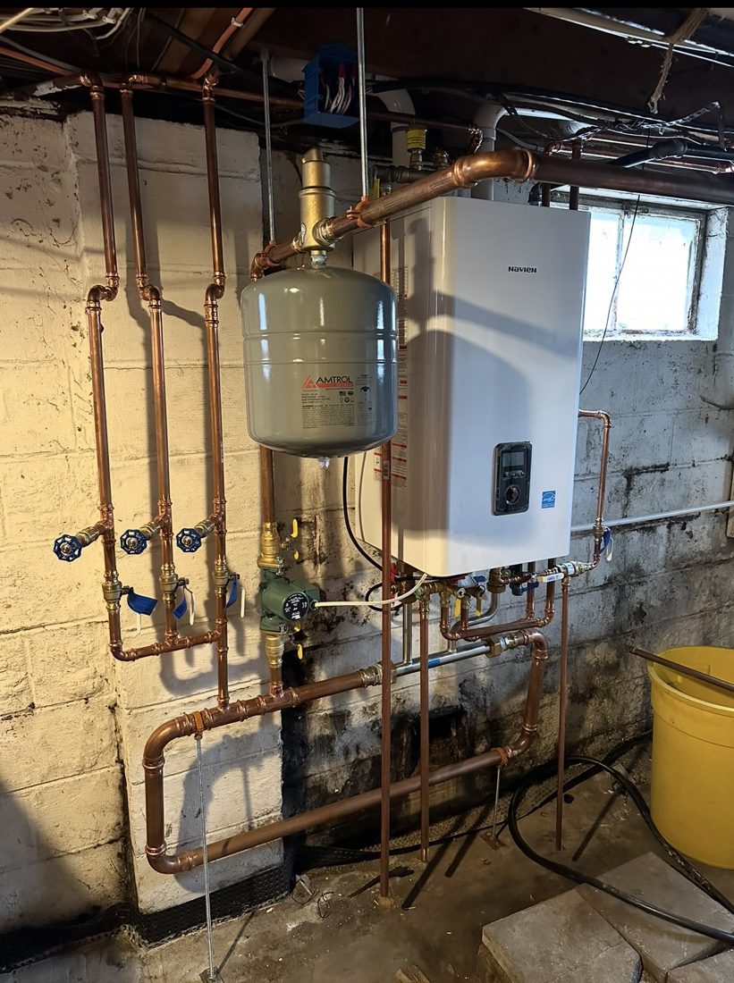 New Navien boiler with copper piping, installed by Honesty Plumbing & HVAC