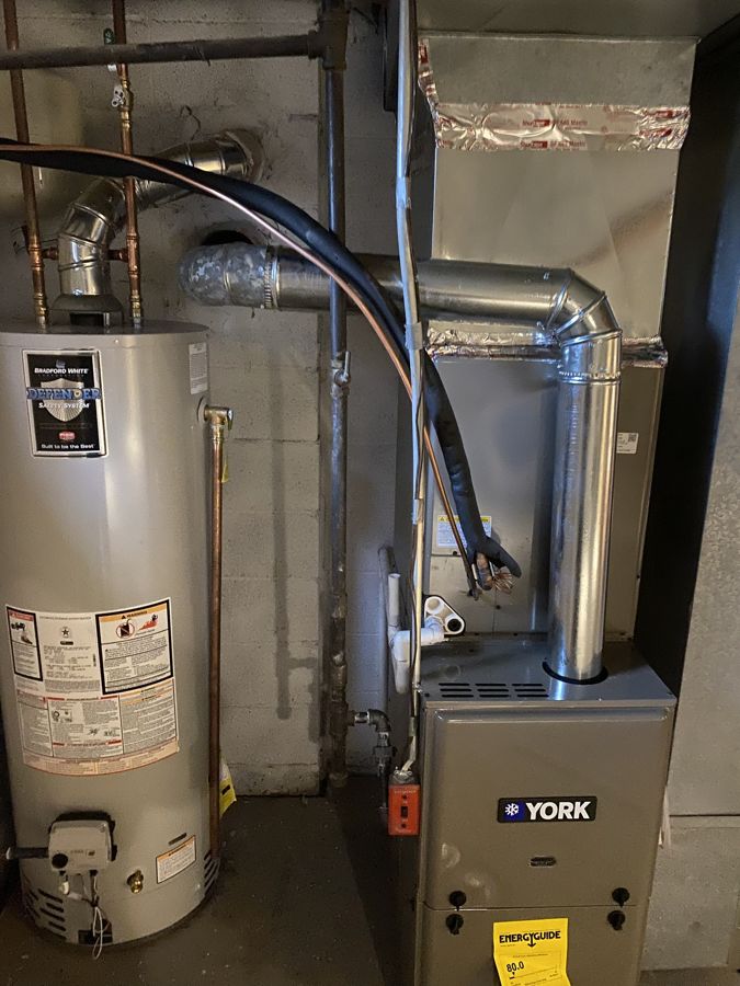 New York furnace with a Bradford White water heater.